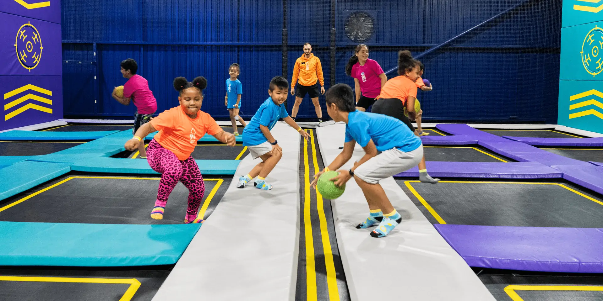 Children playing on trampolines